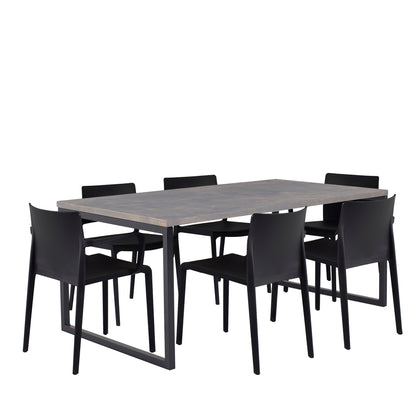 A modern dining table and chairs with a sleek, dark wooden table and six black chairs (side view)