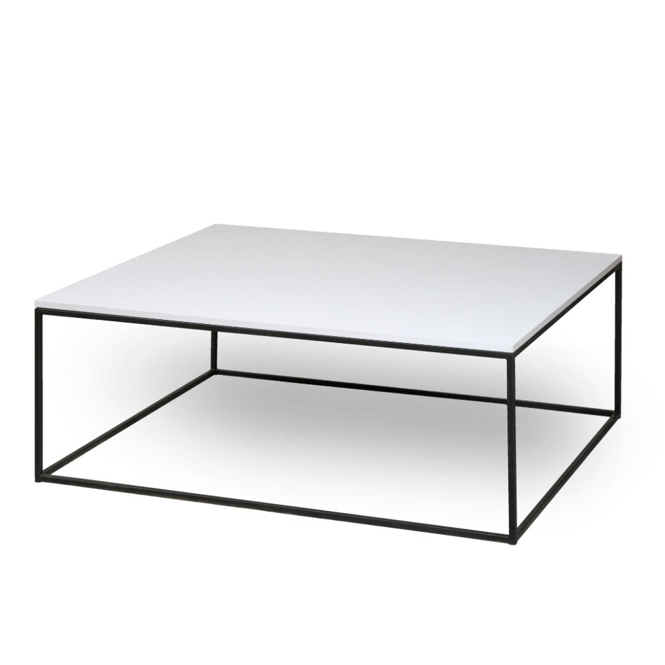 A modern minimalist side table with a black metal frame and a sleek, white tabletop (side view)