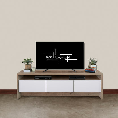 A minimalist living room with a flat-screen tv on a wooden media unit with 3 x Pull open drawers for storage , flanked by two small potted plants and accompanied by a soundbar and a few decorative items.