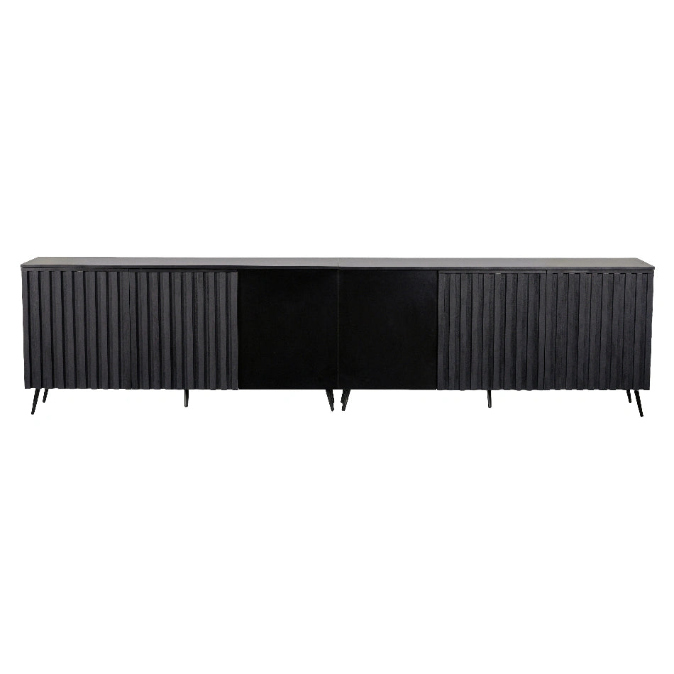 A modern, long black buffet table with vertical slat detailing on the doors and discreet legs, offering ample storage and a sleek silhouette for contemporary interiors.