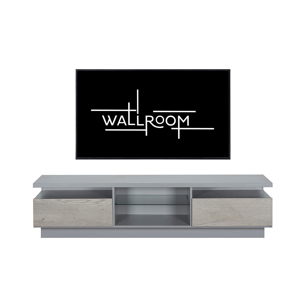 Grey wall-mounted TV shelf with storage compartments below a large plasma tv