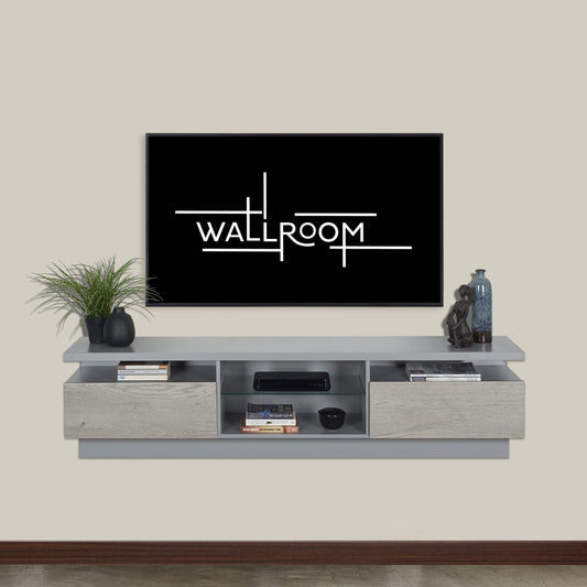 A minimalist living room featuring a grey wall-mounted TV shelf decorative items and storage compartments below a plasma tv.