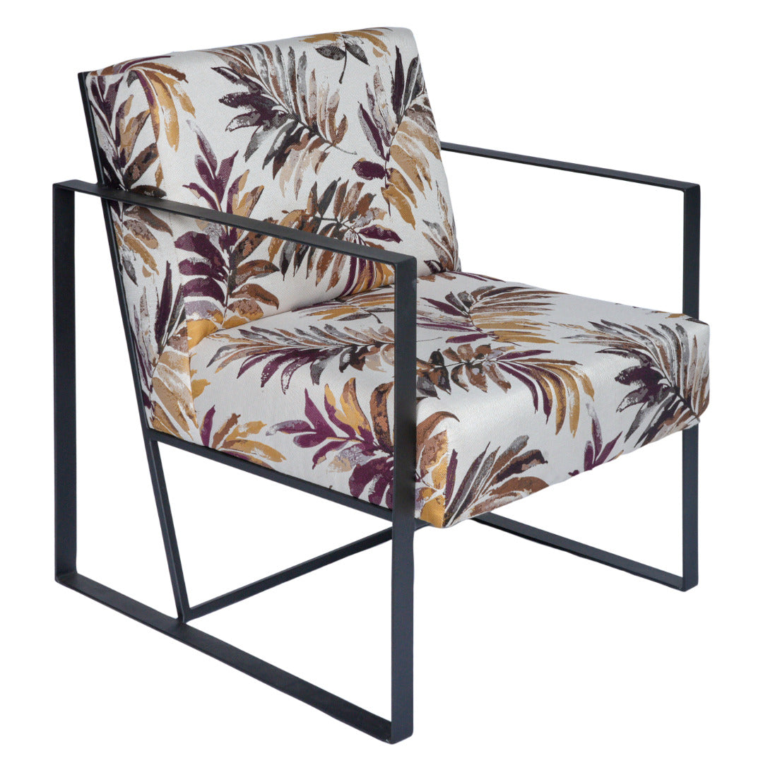 Steel-framed occasional chair with autumn leaves print and plush back and seat cushions