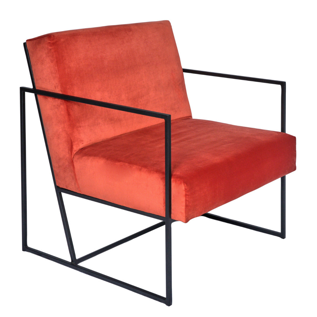 Steel-framed orange occasional chair with back and seat cushions in burnt orange